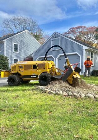 Top Notch Tree's stump grinder doing the grinding on an existing stump in place.